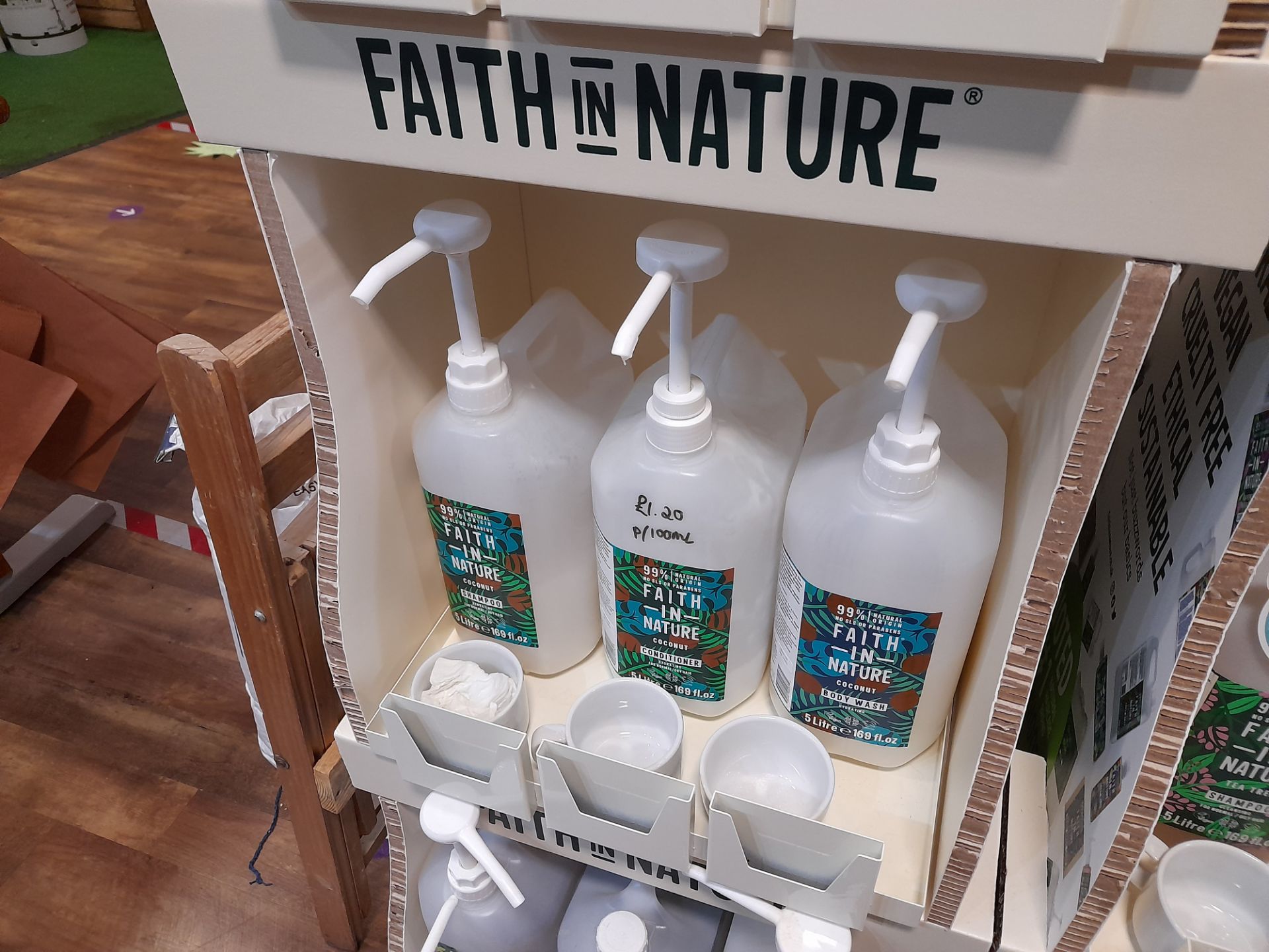 2x Faith in Nature Display Stands with 19x part opened Faith in Nature shampoos, conditioners, - Image 4 of 7