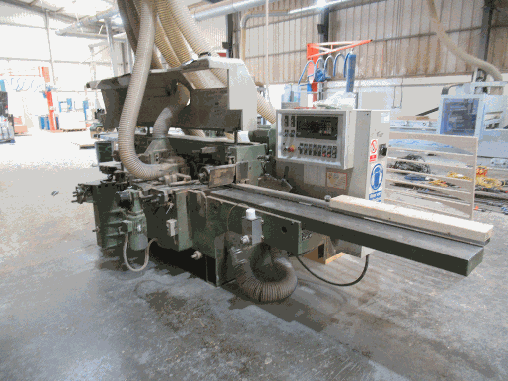 A 1988 Weinig Profimat 22 N Through Feed Moulder