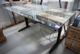 Adapt cantilever rise and fall glass top table (1980 x 1150)