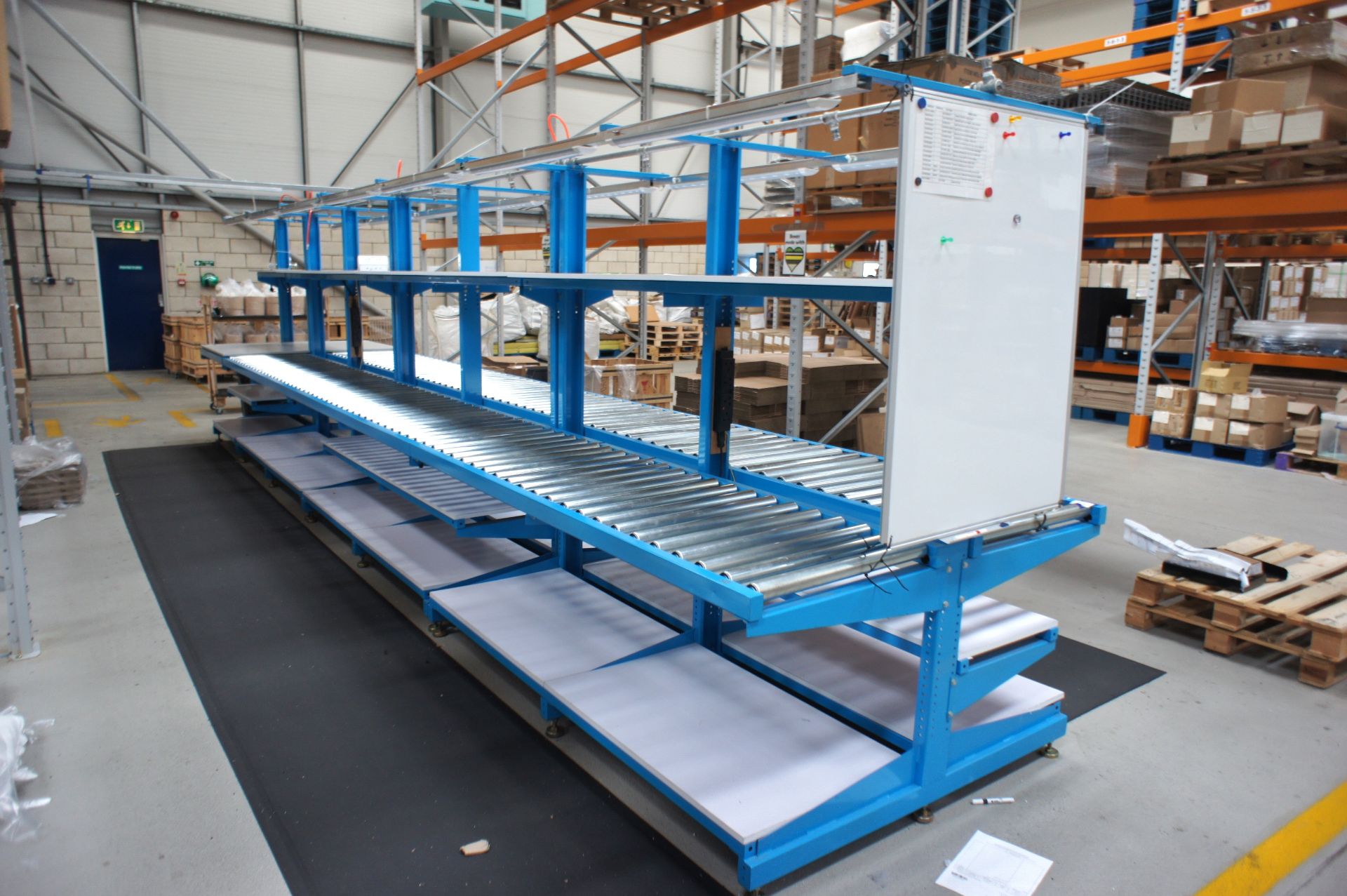 Double sided assembly station, comprising 2 x various worktables, and 2 x lengths of roller conveyor - Image 2 of 3