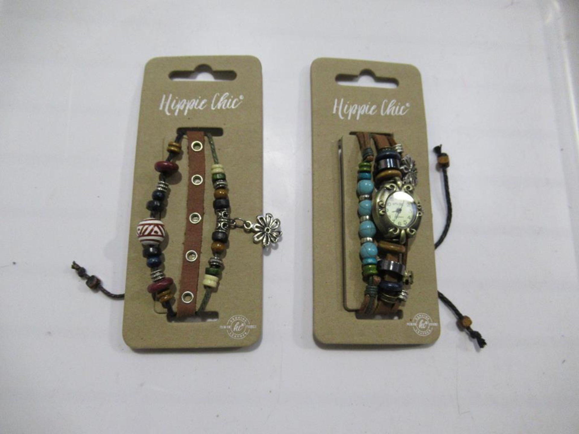 A box of Hippie Chic 'Bazaar' watches and 'Boho' bracelets - unopened (100 of each); Total approx RP