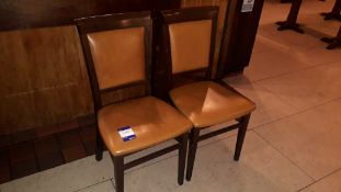 2 Franzoni reclaimed Peroba wooden dining chairs upholstered in mustard faux leather