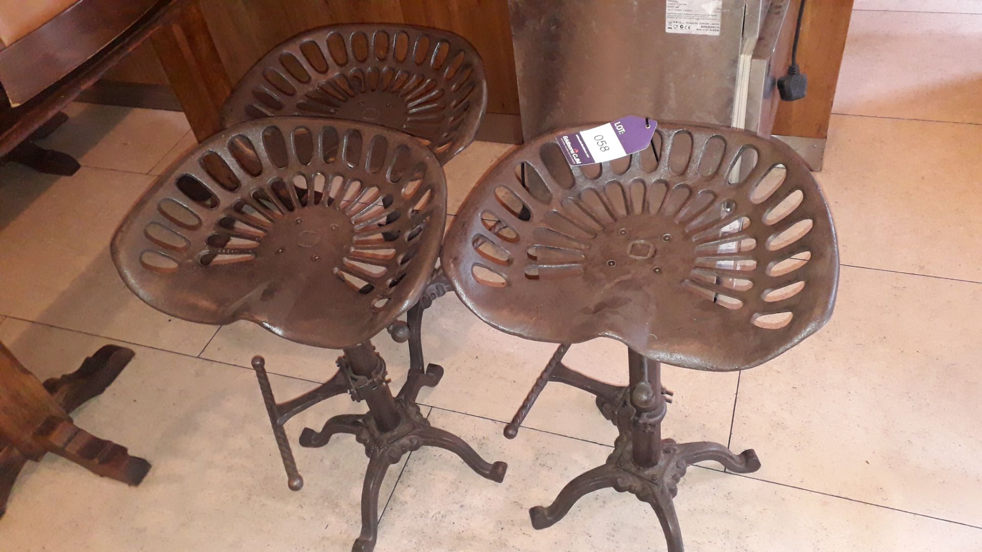 3 vintage cast iron adjustable height tractor seat stools