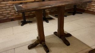 2 timber tables on wooden supports, 1,110 x 700mm