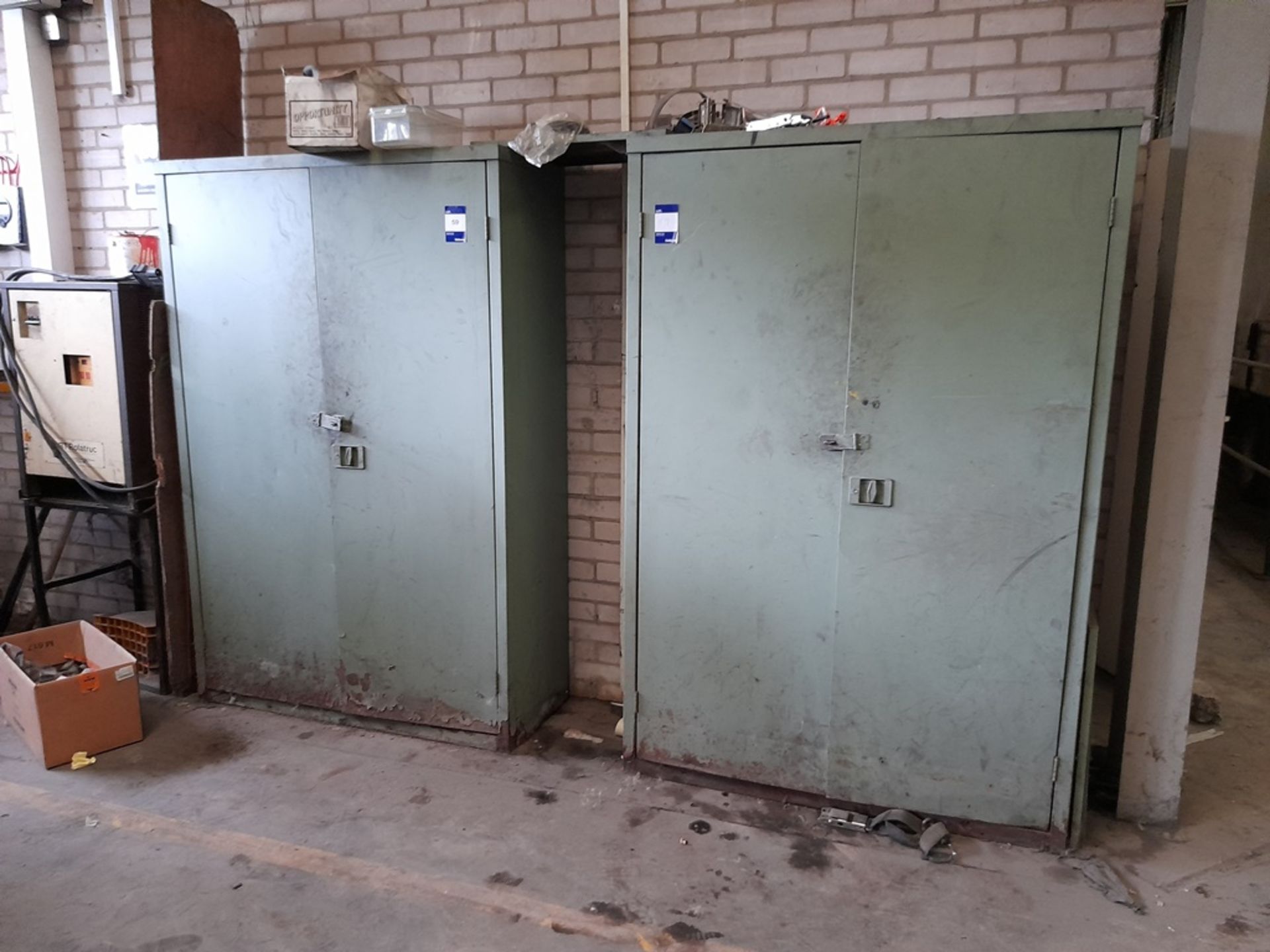 2 – Metal double door cupboards, and contents