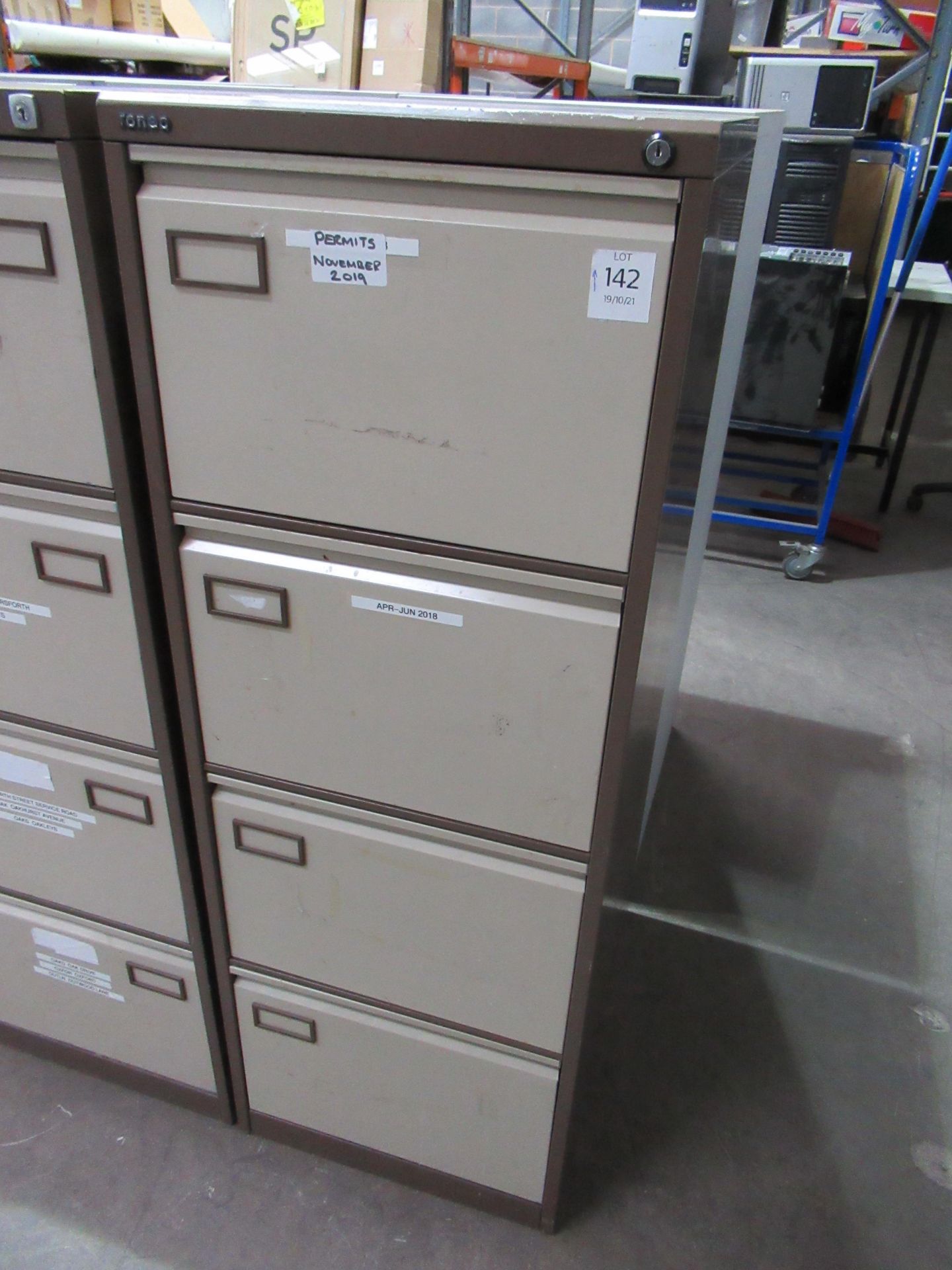 Two four drawer filing cabinates (no keys)