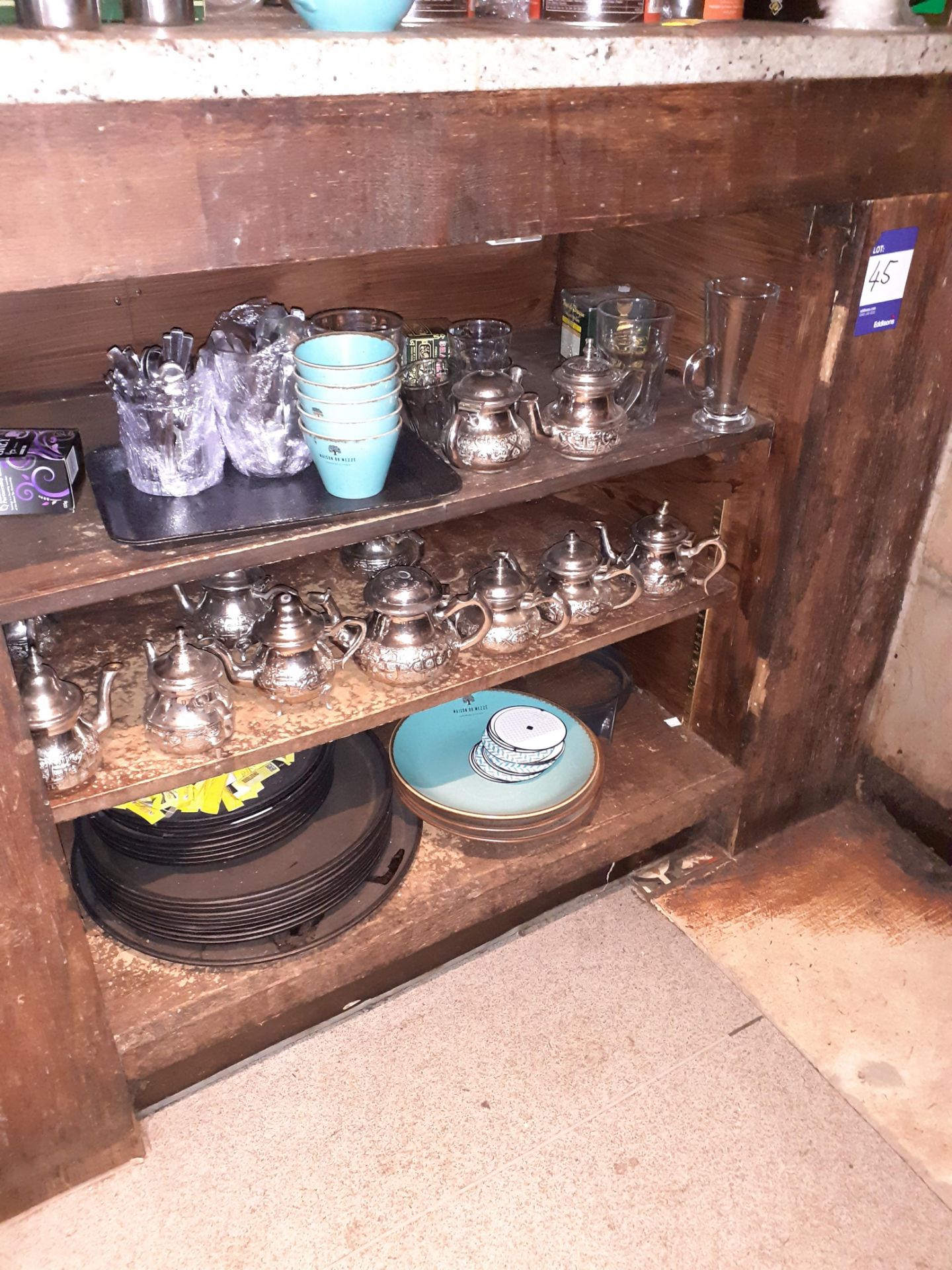 Contents of Shelves to include Teapots, Trays & Crockery, Located at 14 Leicester Square, London