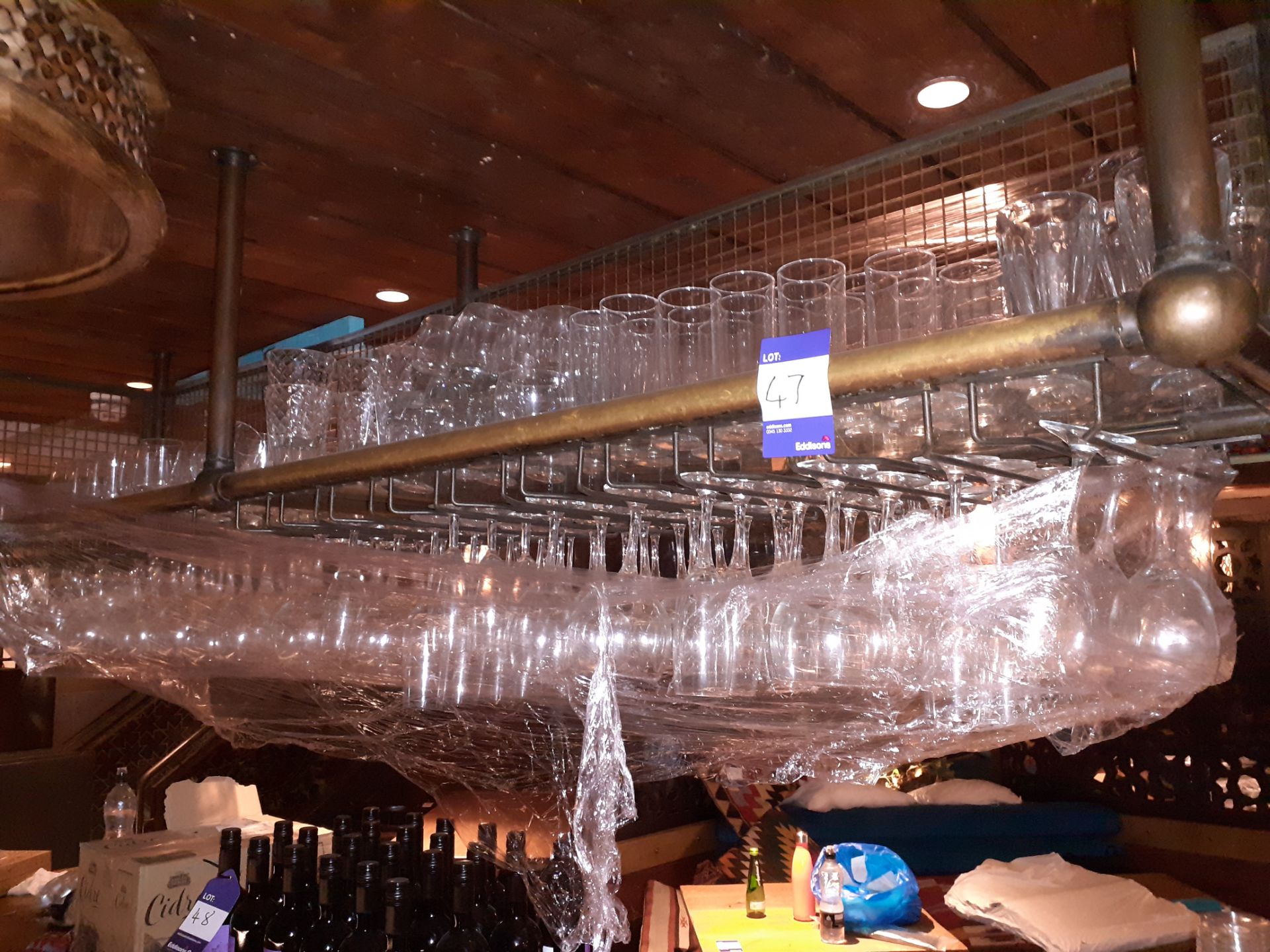 Glassware to above Bar Shelving, Located at 14 Leicester Square, London WC2H 7NG