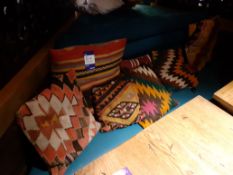 7 Arabic Carpet Cushions, Located at 14 Leicester Square, London WC2H 7NG