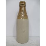 Houghton-Le-Spring M. Sutherland impressed stone bottle (20cm)