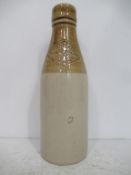 Houghton-Le-Spring M. Sutherland impressed stone bottle (20cm)