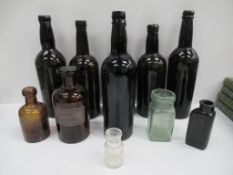 Qty of mainly coloured unnamed Glass Bottles