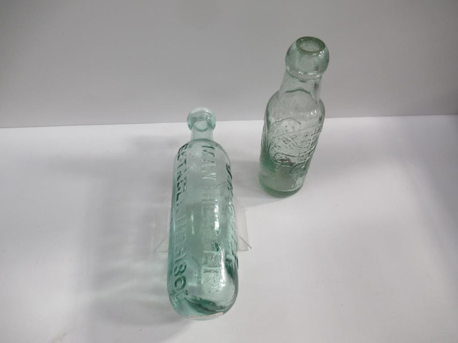 Manchester J.H.Cuff rounded bottom bottle with S.Bradbury & Son bottle