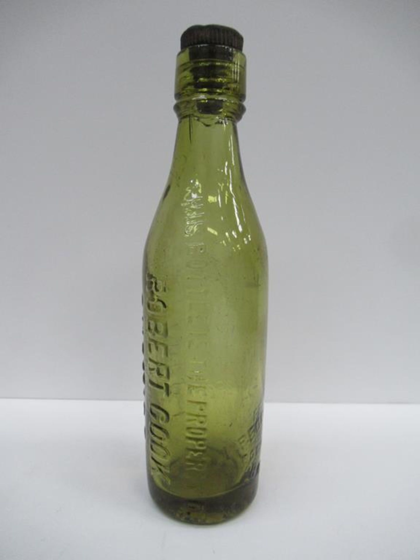 Grimsby Robert Cook coloured bottle complete with R.Cook stopper - Image 2 of 6