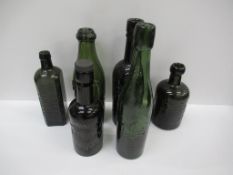 6x green coloured glass bottles