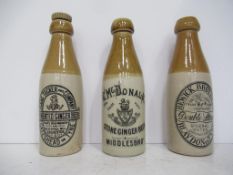 3x stone bottles, 1x Isaac Tucker and Company- Gateshead on Tyne, 1x McDonald- 'Middlesboro' and 1x