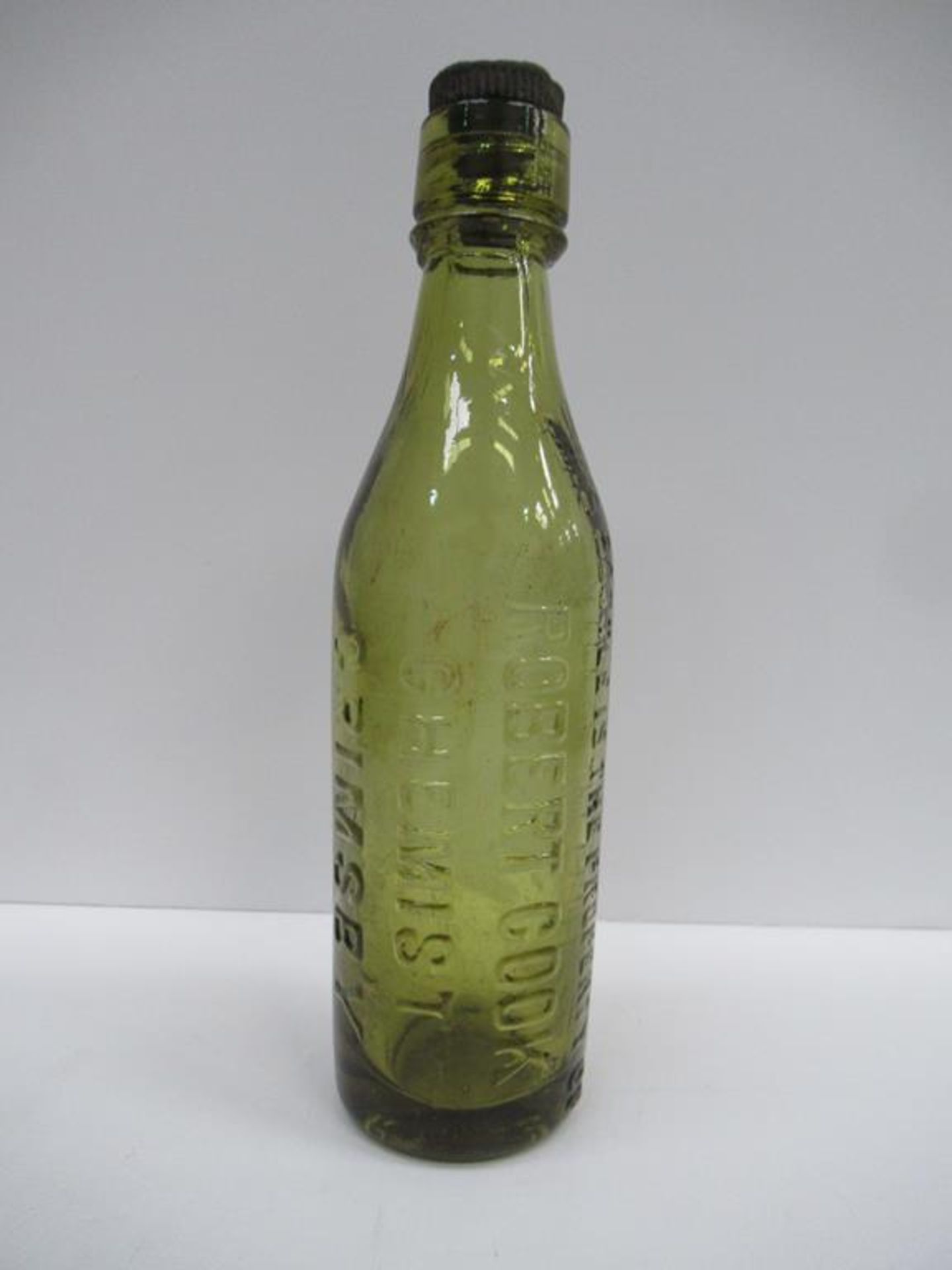 Grimsby Robert Cook coloured bottle complete with R.Cook stopper