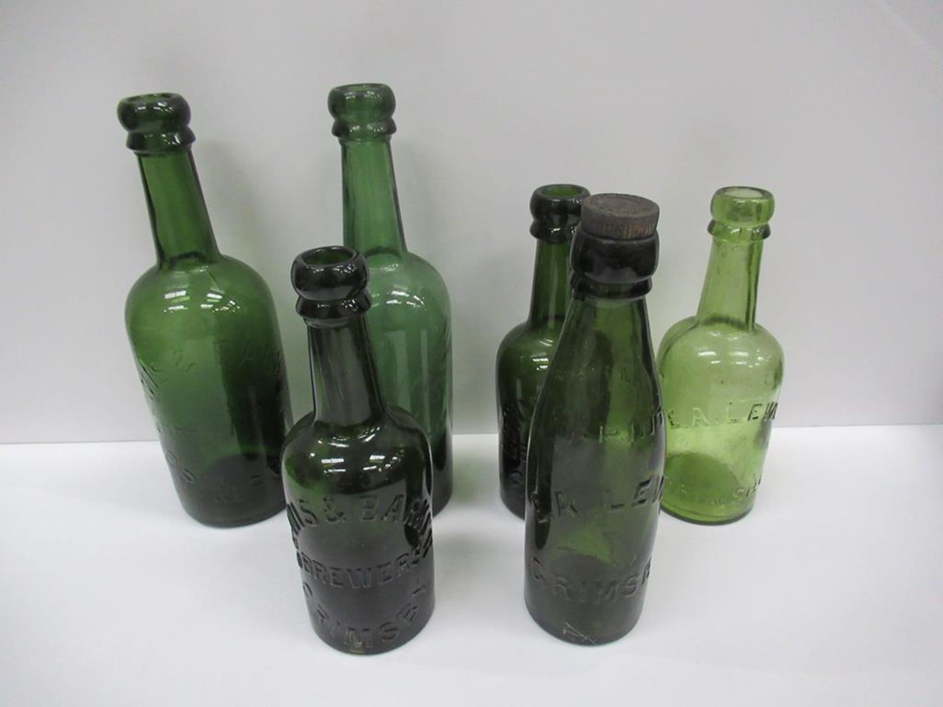 6x Grimsby E.A Lewis (3) and Lewis & Barker (3) coloured bottles