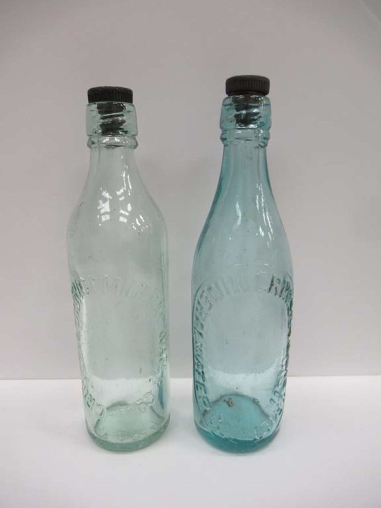 2x Grimsby & District Mineral Water Co. Ltd bottles- one coloured