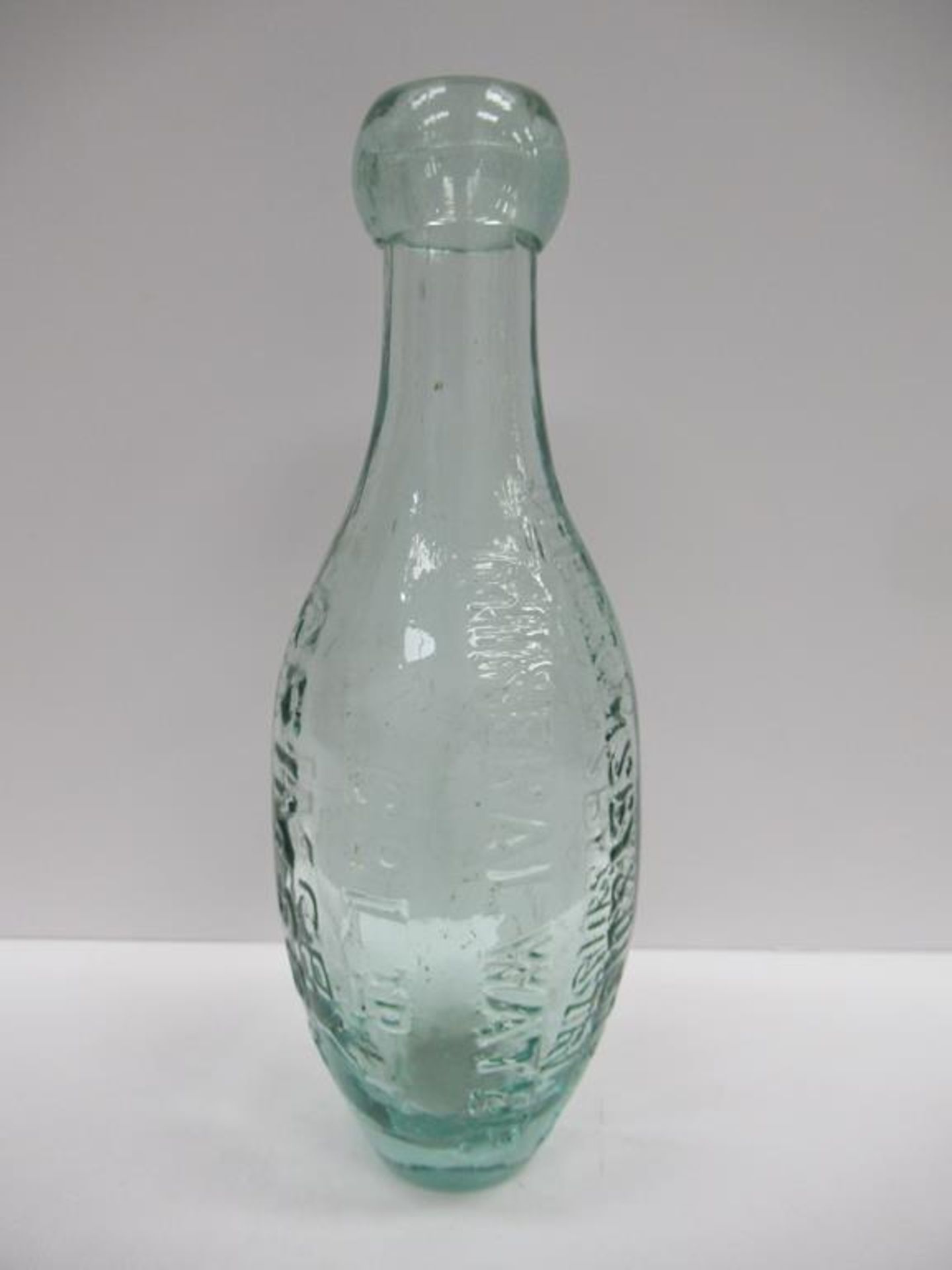 The Grimsby & District Mineral Water Co. Ltd small bulbous bottle