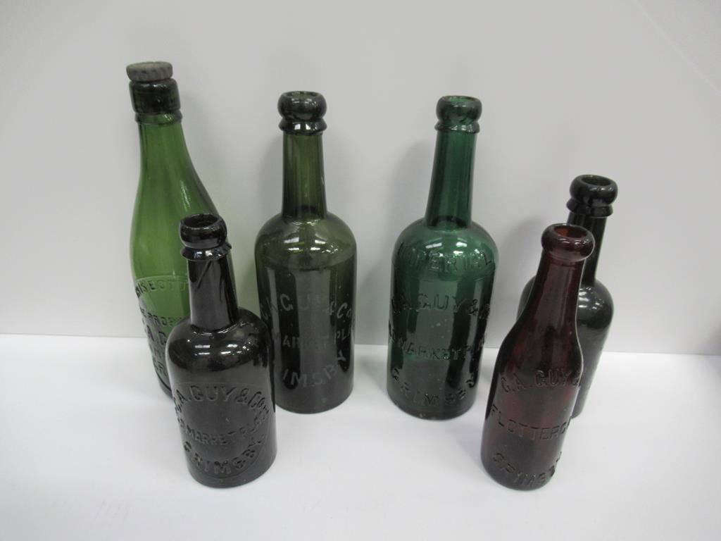 6x Grimsby C.A. Guy & Co coloured bottles (1x Flottergate)
