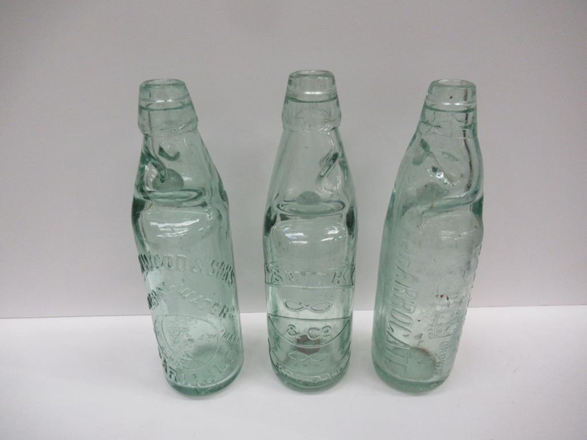 3x Codd bottles including Smith & Co- Bourne, Denwood & Sons- Carlisle and Busfield Bros- Harrogate