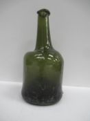 Green coloured glass 'wonkey mallet' bottle