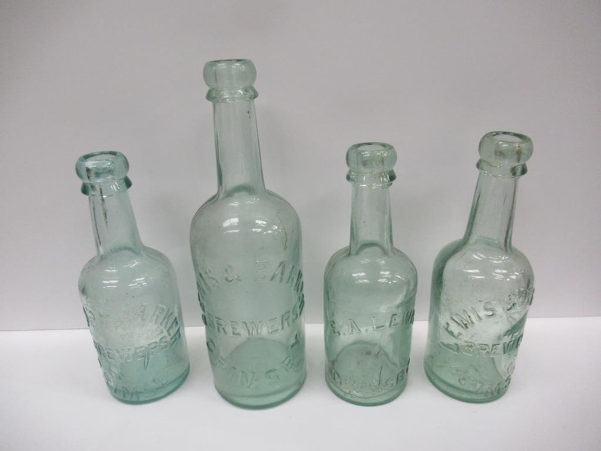 4x Grimsby E.A Lewis (1) and Lewis & Barker (3) bottles