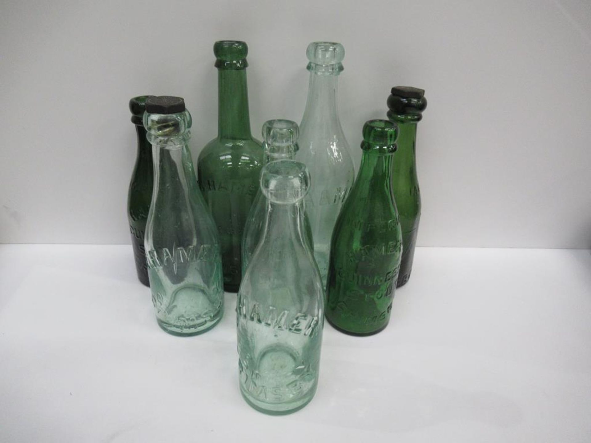 8x Grimsby E.Hamer bottles (4x coloured)