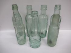 7x Grimsby J.A. Christian bottles