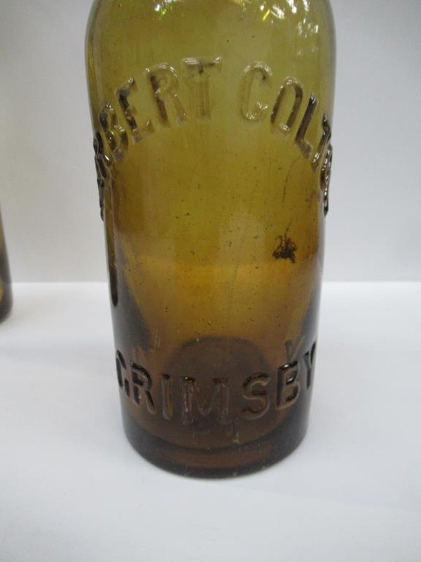 5x Grimsby Herbert Coulton (3) E.W Beckett & Co (1) and Beckett & Sons (1) bottles (4x coloured) - Image 9 of 20