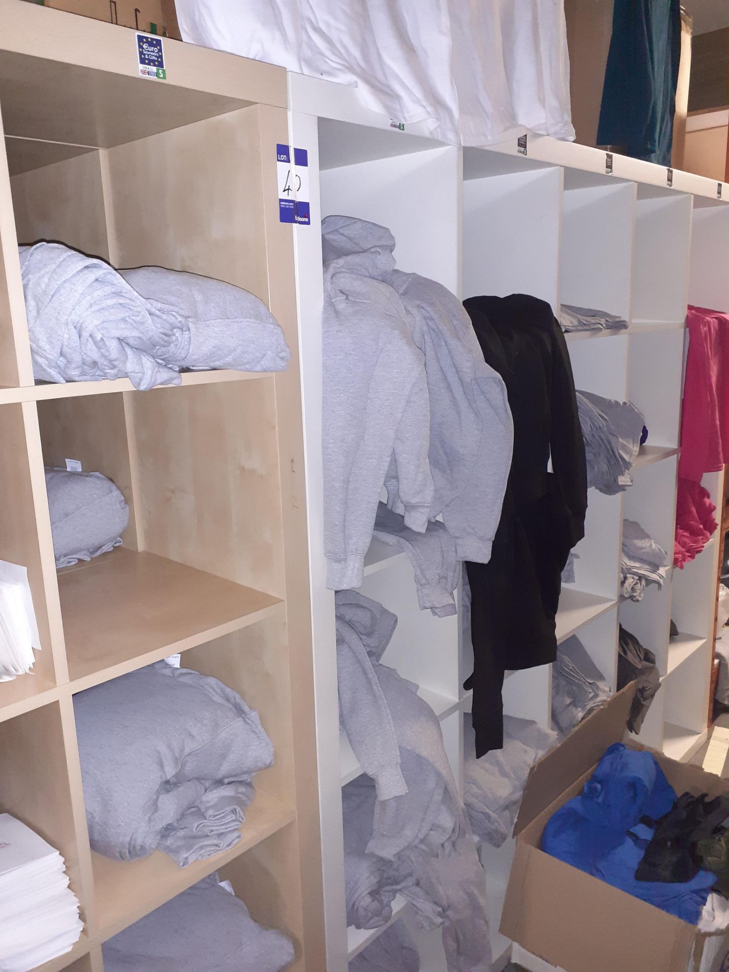 Quantity of Plain Hooded Sweat Shirts & T-Shirts to Shelving