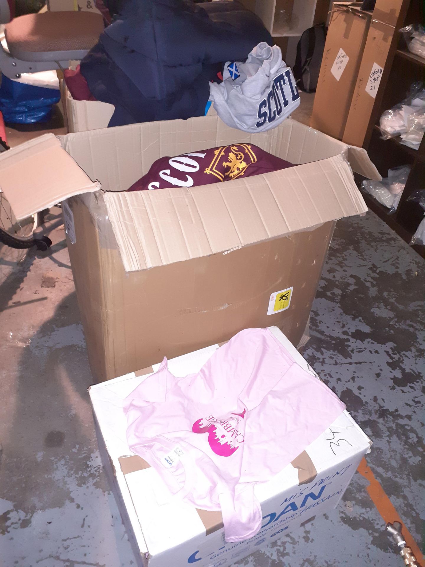 Two Boxes of Scottish Themed Clothing & Box of Cambridge Themed T-Shirts