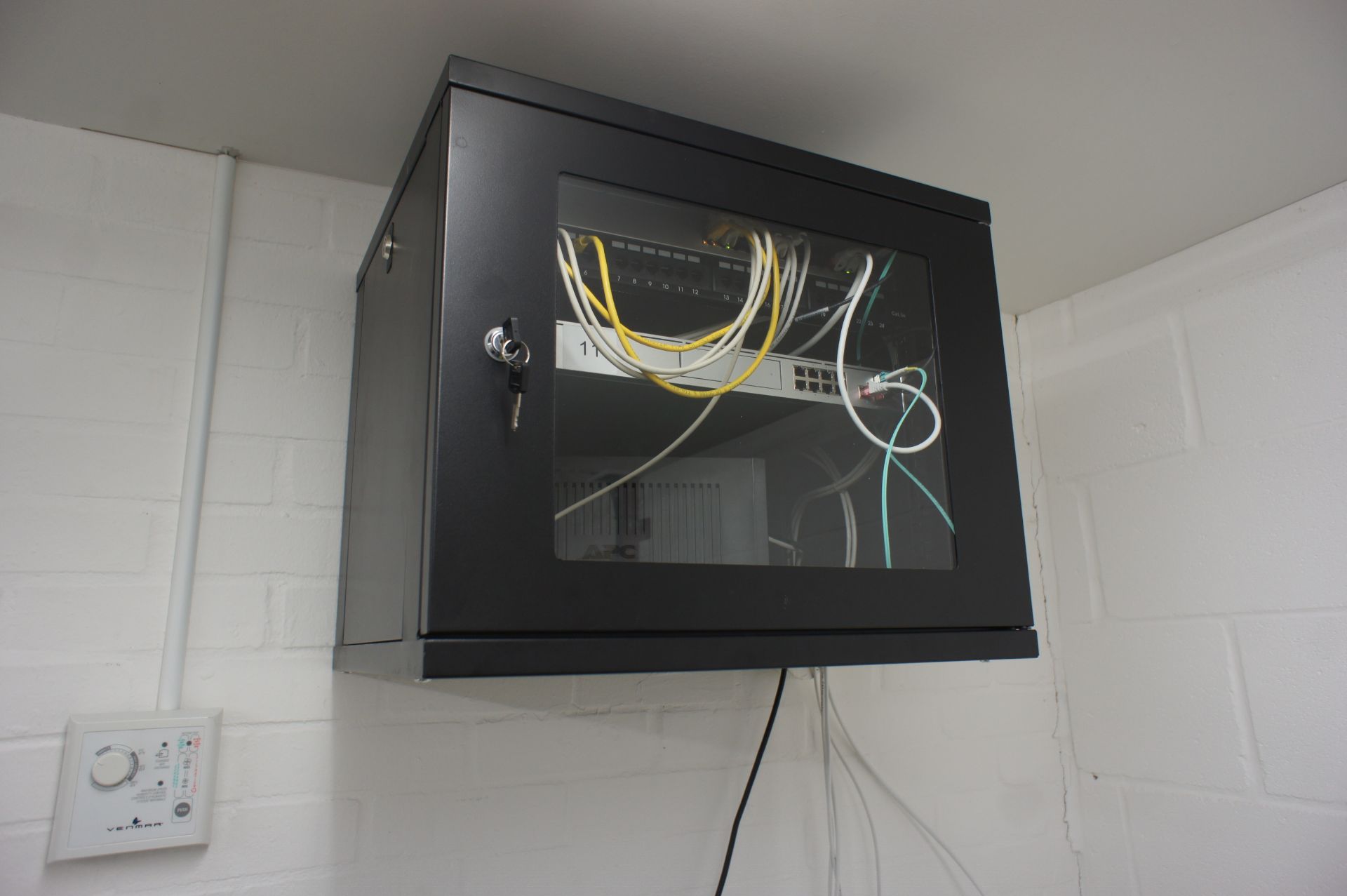 Wall mounted Comms Cabinet with contents including