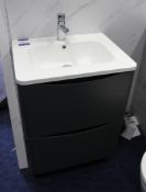 Vanity unit with plastic sink (600L x 830H x 480D), with dark grey double drawer unit, and tap