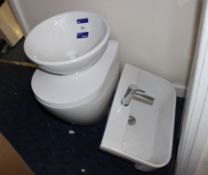 2 x Sink basins and toilet and wall cabinet