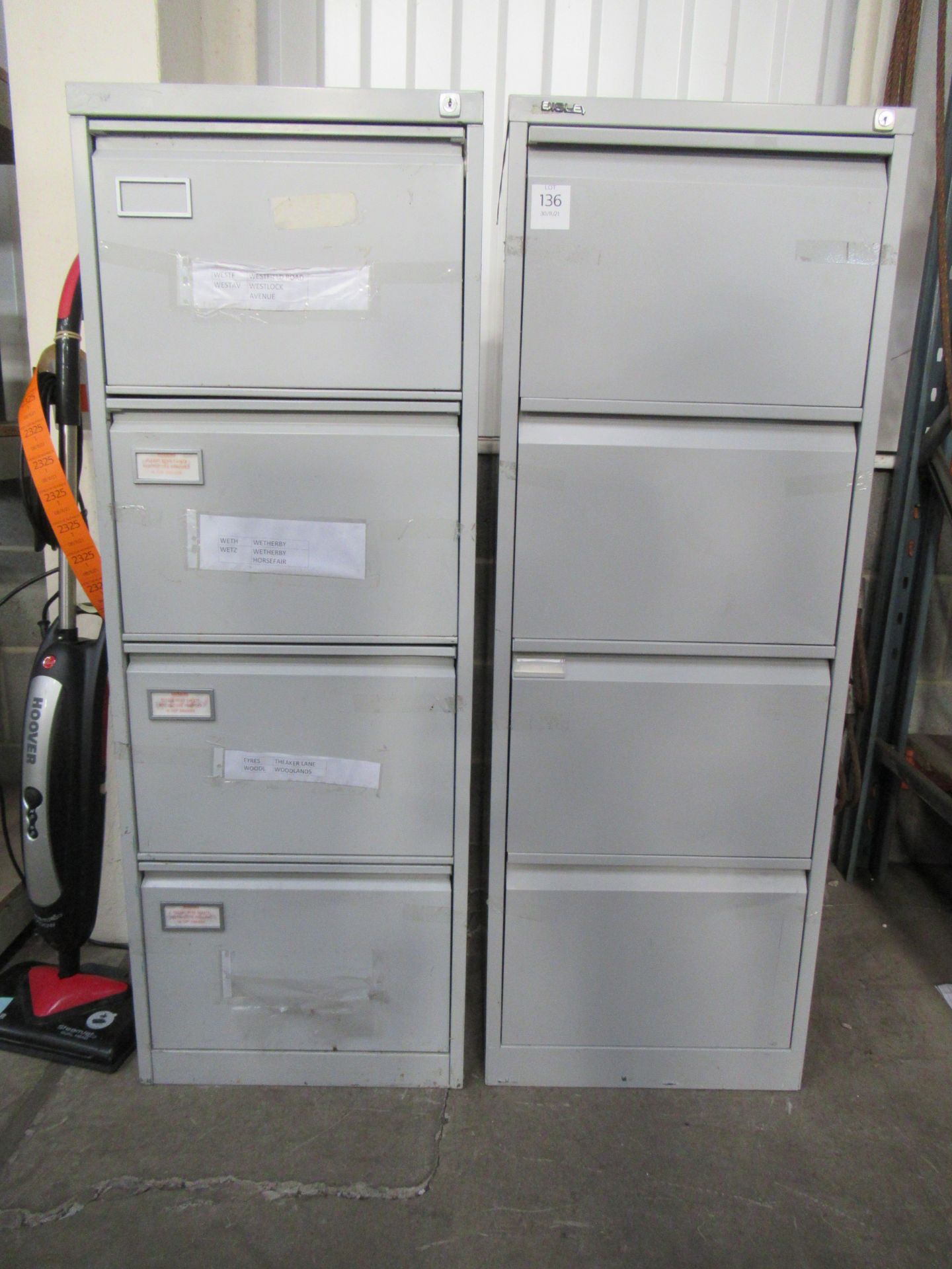 Two four drawer cabinets