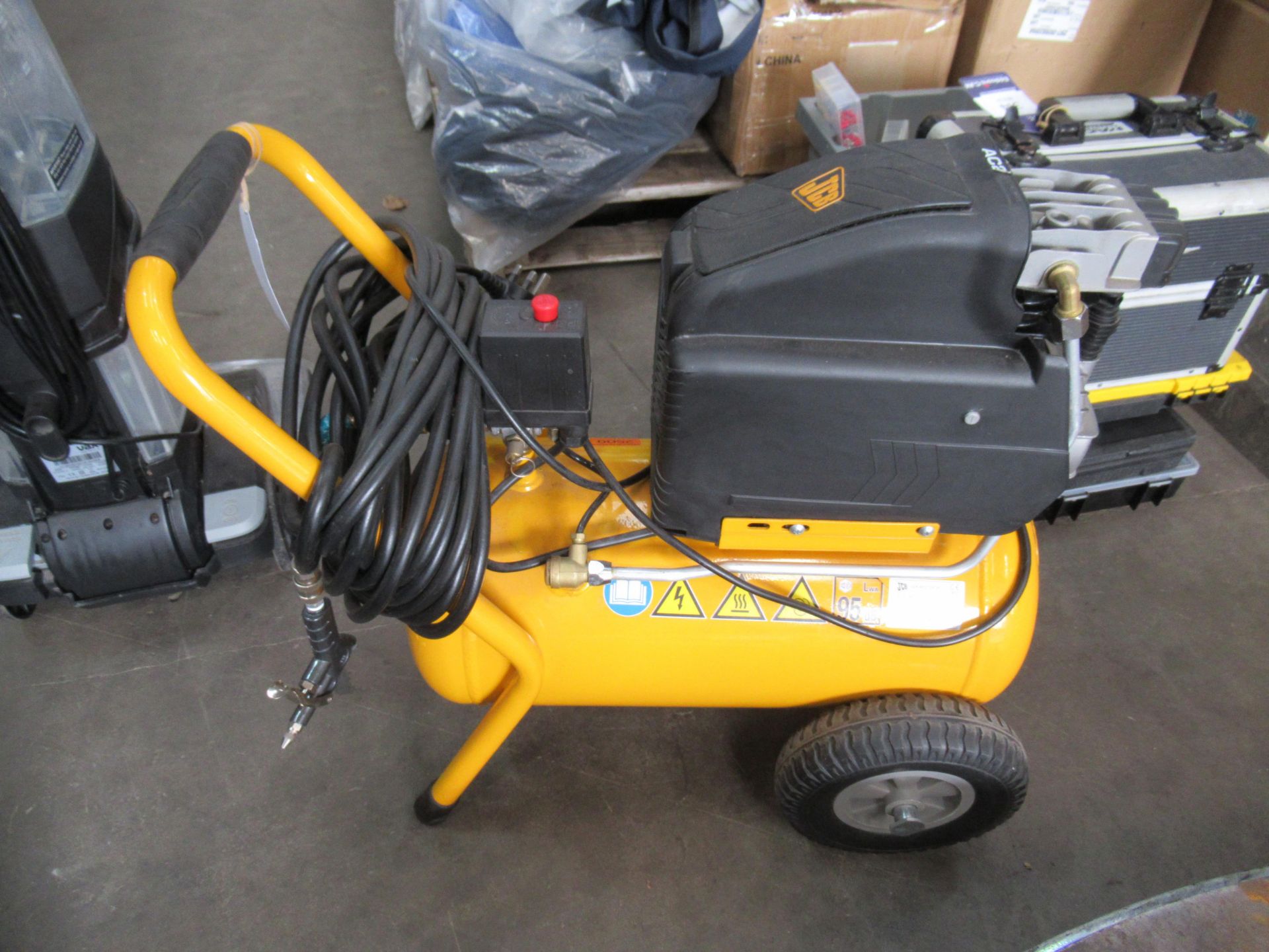 A JCB 240v compressor