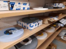 Quantity of various Norton grinding wheels as photographed (Shelving not included)