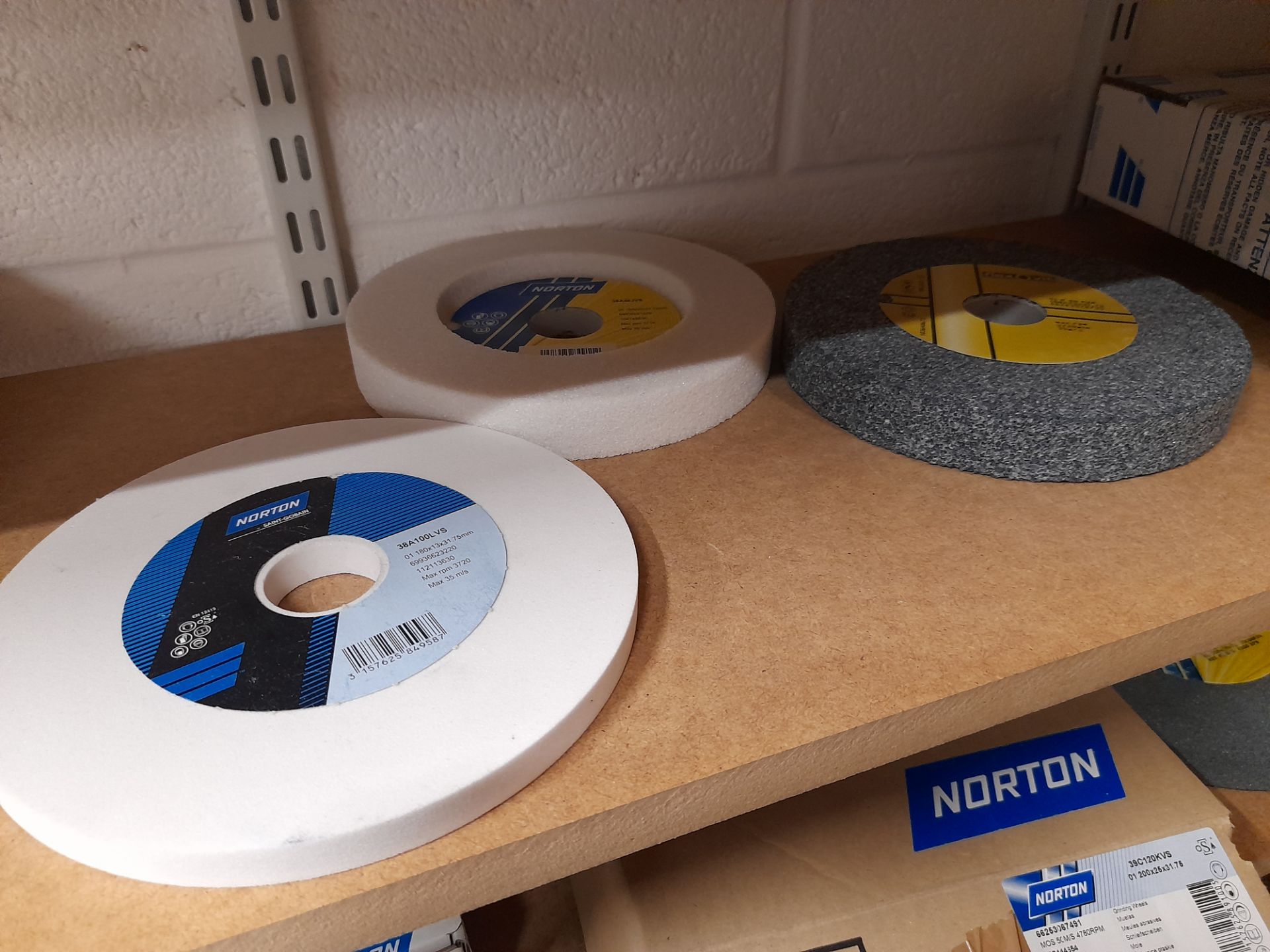 Quantity of various Norton grinding wheels as photographed (Shelving not included) - Image 3 of 5