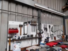 Quantity of various engineers tools to wall mounted boards