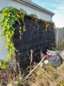 10 panels of metal fencing, with 14 metal posts, as photographed