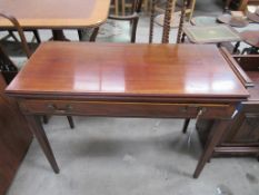 A Folding Top Games Table with Drawer