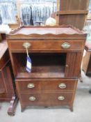 A Mahogany Cabinet with Three Drawers and a Tambour Door