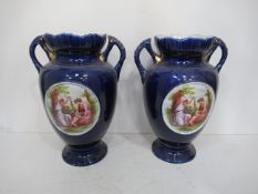 A Pair of Blue Vases with Angelica Kaufmann Scenes (28cm)