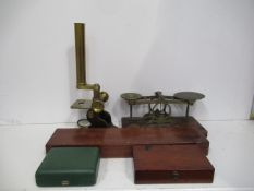 Shelf of Measuring Equipment including Compass, S.Mordan Weighing Scales etc