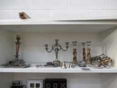 Shelf including Candle Snuffers and Candlesticks