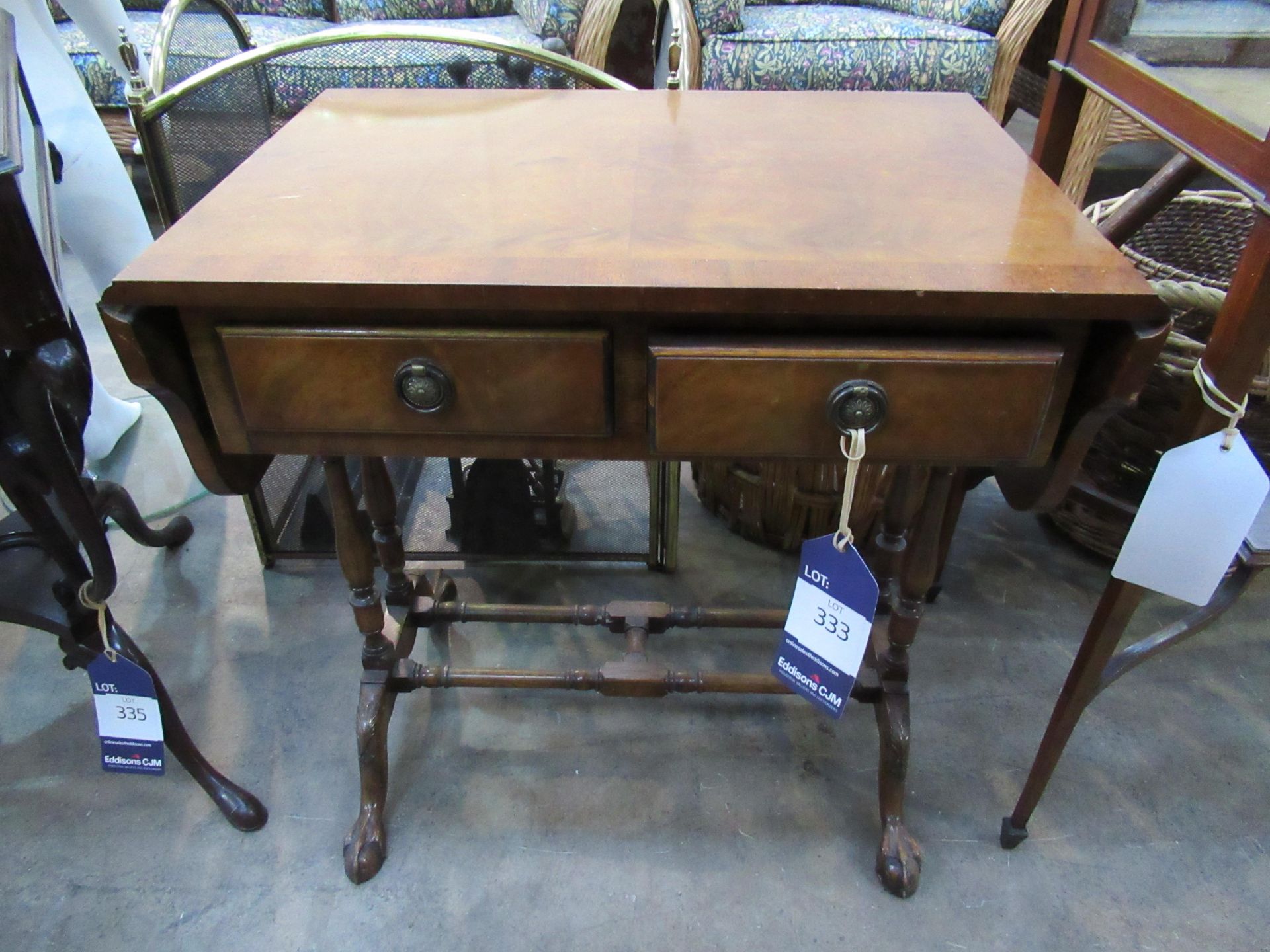 Two Drawer Extending Hall Table Raised on Ball and Claw Feet