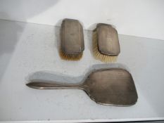 2 Silver Brushes and 1 x Silver Mirror marked Birmingham 1937/38, 1938/39 and one worn Hallmarked