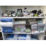 Shelf of unused and sealed Bed Sheets